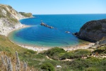 Weitere halbrunde Buchten zum Baden nahe der Durdle Door.