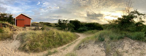 Stürmischer Sonnenuntergang in den Dünen von Mellbystrand.